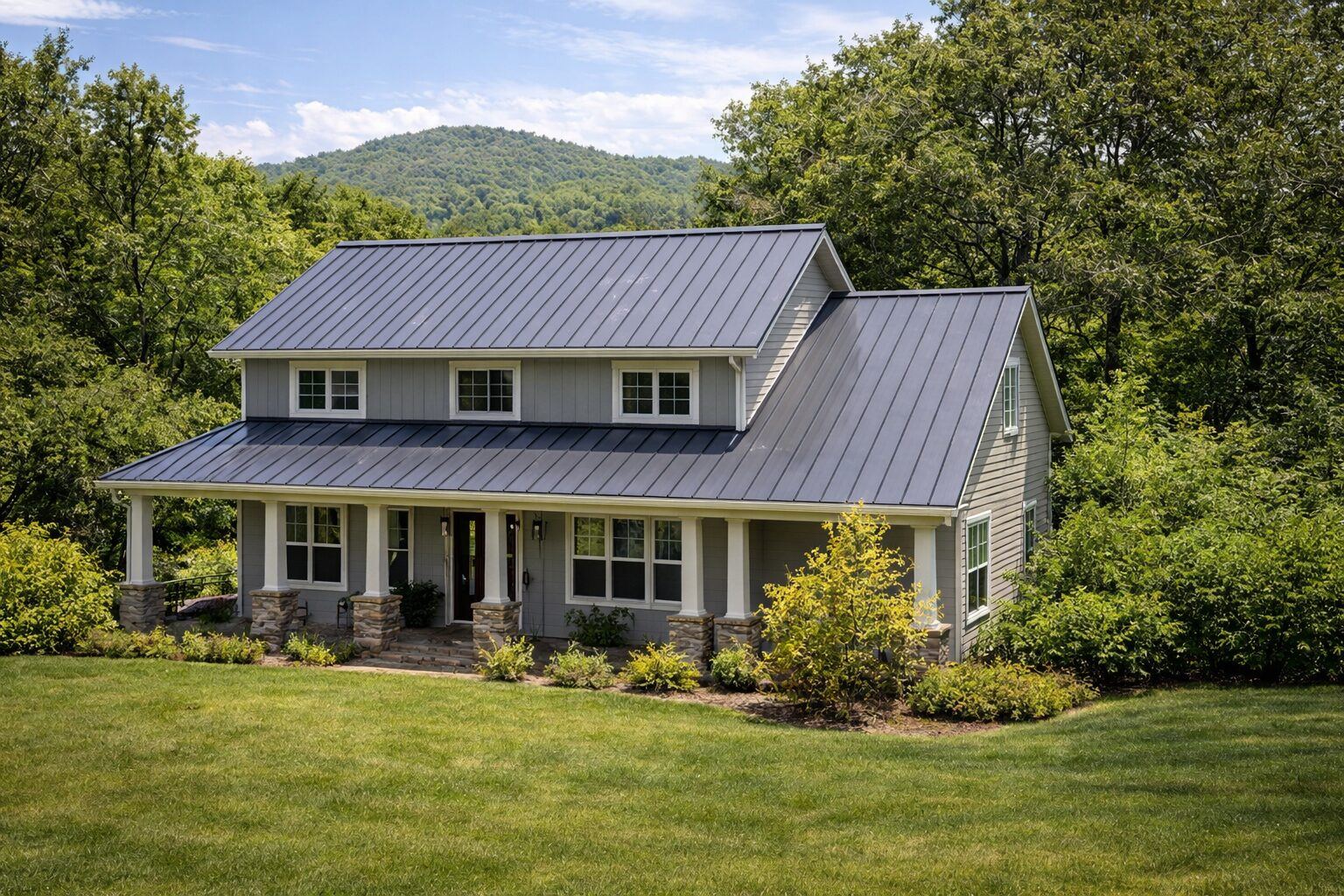 New metal roof replacing an aging shingle roof on a foothills home